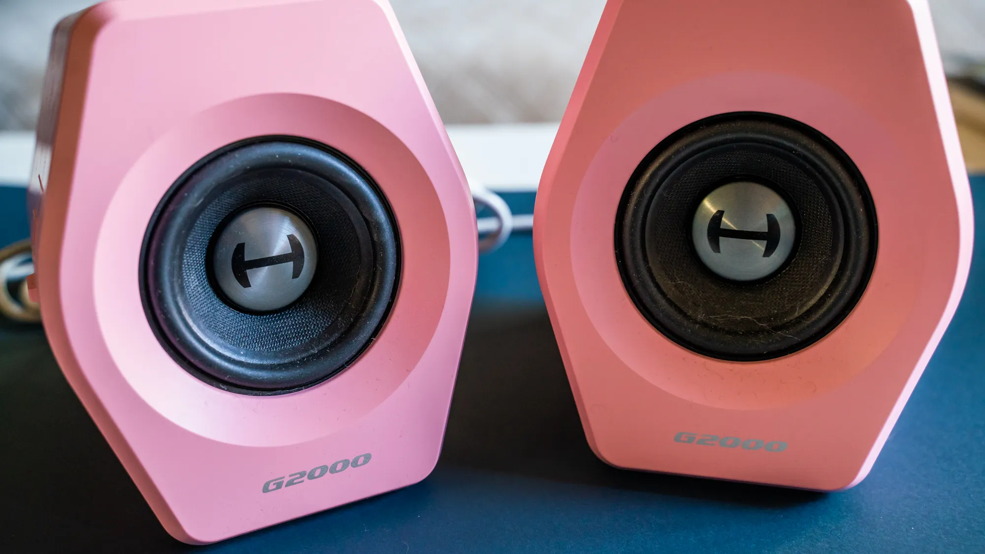 Edifier G2000 in pink on a table