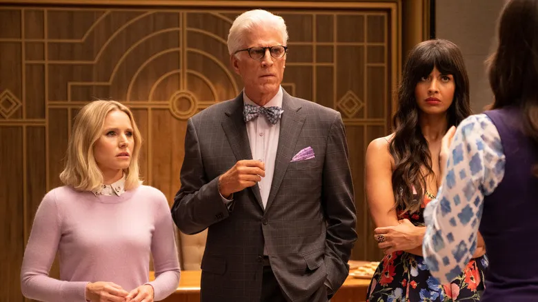 Eleanor, Michael, and Tahani looking at Janet in The Good Place (2016)