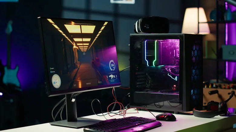 RGB gaming PC setup with monitor and desktop tower.