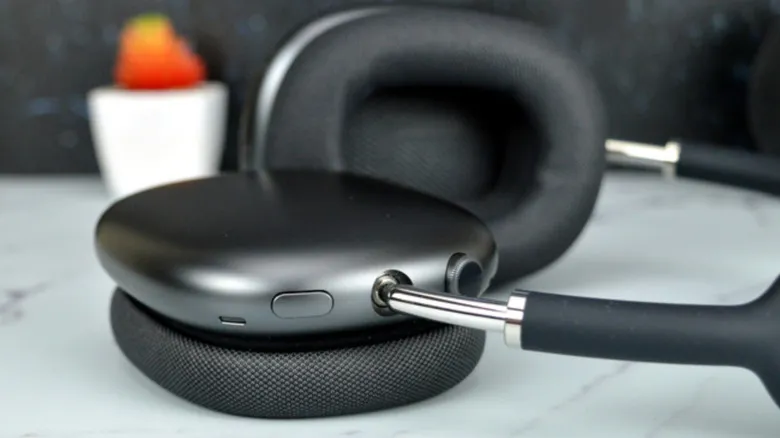 Close-up shot of AirPods Max on a white table