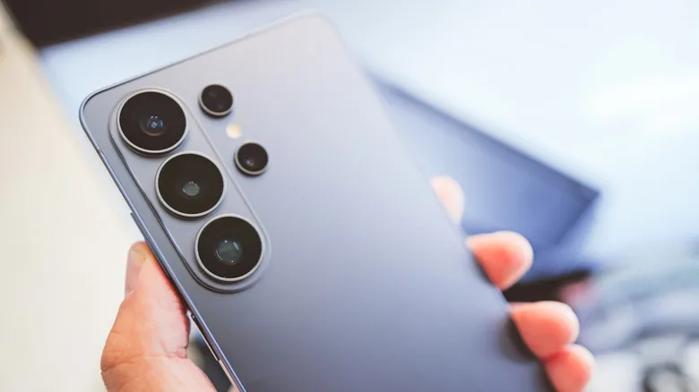 an up close shot of a person holding the Samsung Galaxy S26 Ultra
