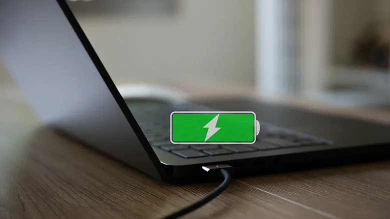 Laptop with icon indicating battery is fully charged