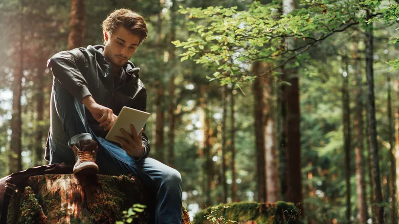 Using a tablet while in the woods