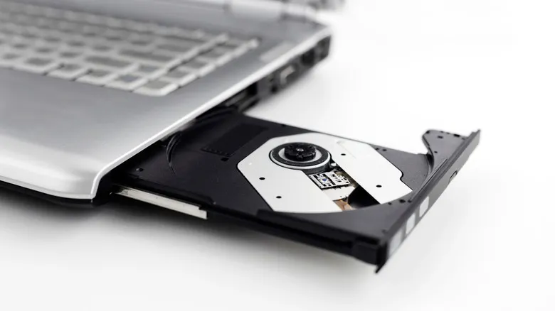 an laptop with an open empty tray for a cd or dvd