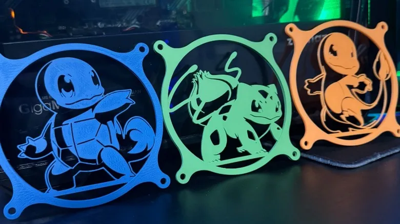 From left to right: 120 mm fan covers featuring the Pokemon Squirtle, Bulbasaur, and Charmander.