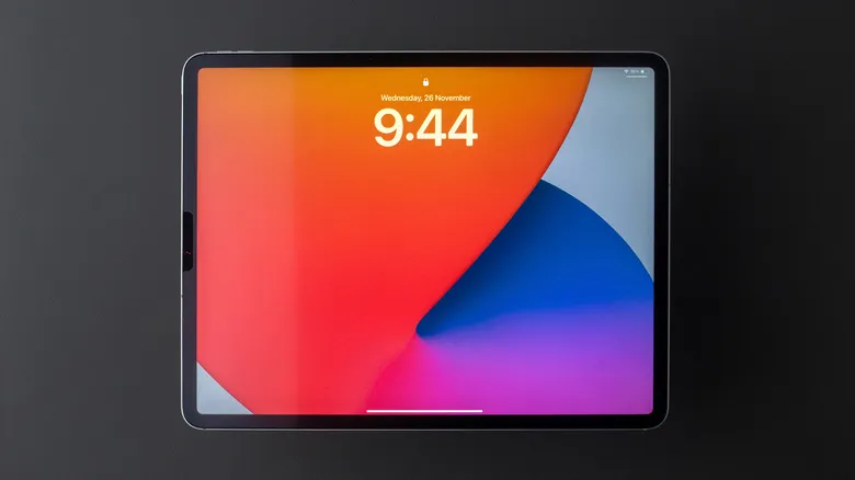 Front view of an iPad Pro in front of a black background
