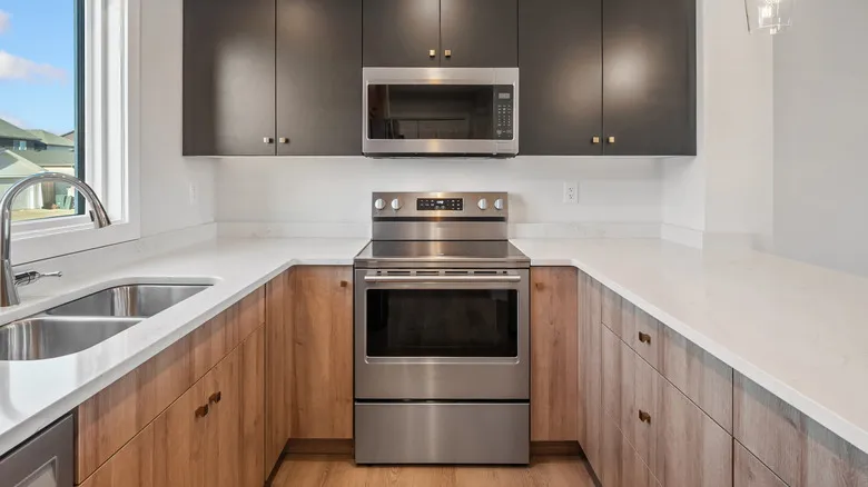 A microwave oven and a wall oven in the kitchen.