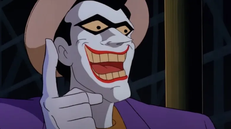 Joker having an idea smiling