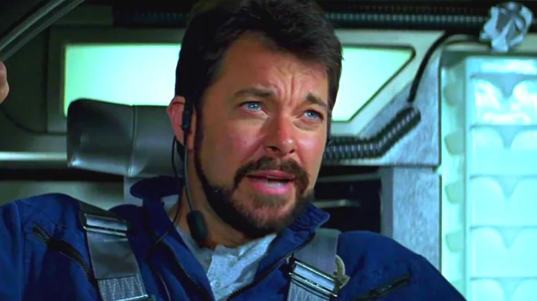 Riker (Jonathan Frakes) talking from a cockpit seat in Star Trek: First Contact