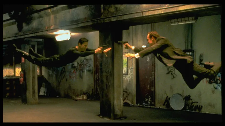 Keanu Reeves takes part in an action shot from "The Matrix"