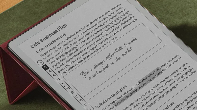 Kindle Scribe without front light, zoomed in close with cafe business plan showing