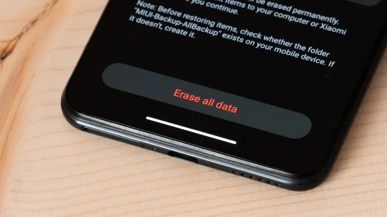 A smartphone showing the option to erase all data