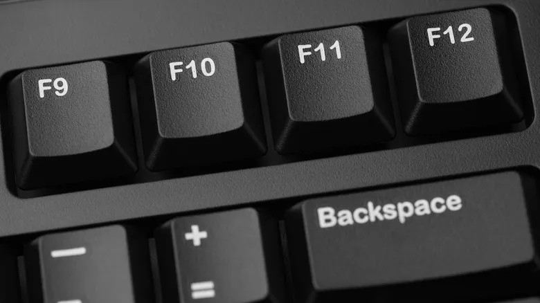 Close-up of the F9, F10, F11, and F12 function keys on a keyboard