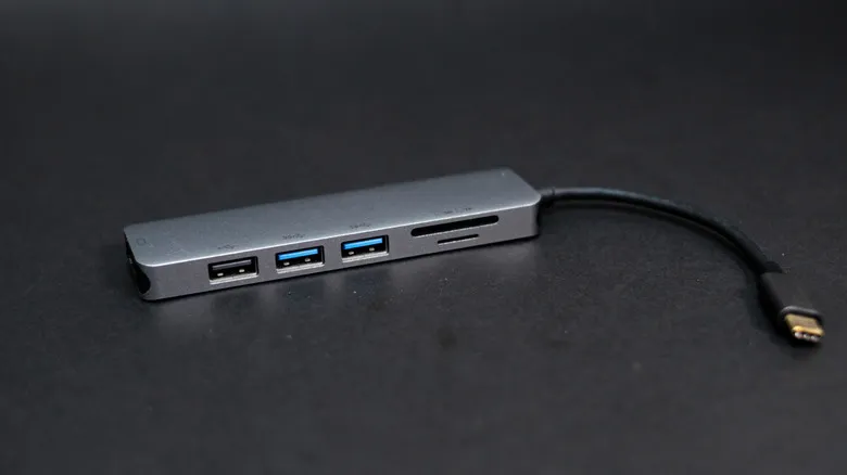 A USB hub on a grey surface