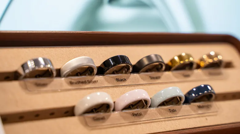 An Oura Ring display showing many different styles and finishes